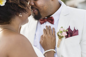 Black Couple wearing red bow tie from PRochelin