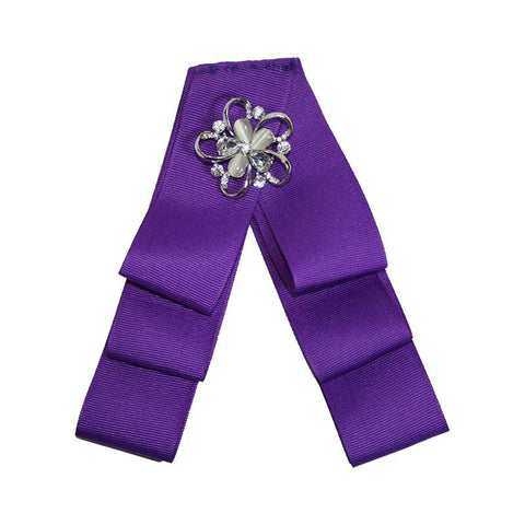 Front View of a Purple Bow Brooch